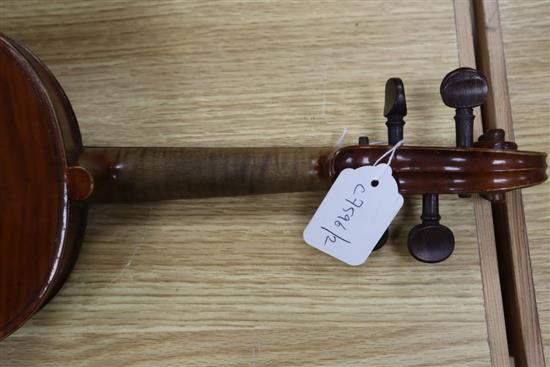 A ate 19th century German violin labelled Heinrich Schwartz Leipzig 1894 cased with a bow